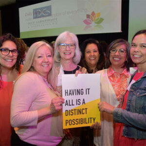 Lotus Network members smiling together at a community gathering